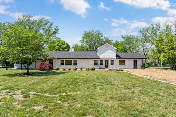 1503 5th Avenue West Springfield, TN 37172 - Photo 42 of 43 a front view of a house with a garden