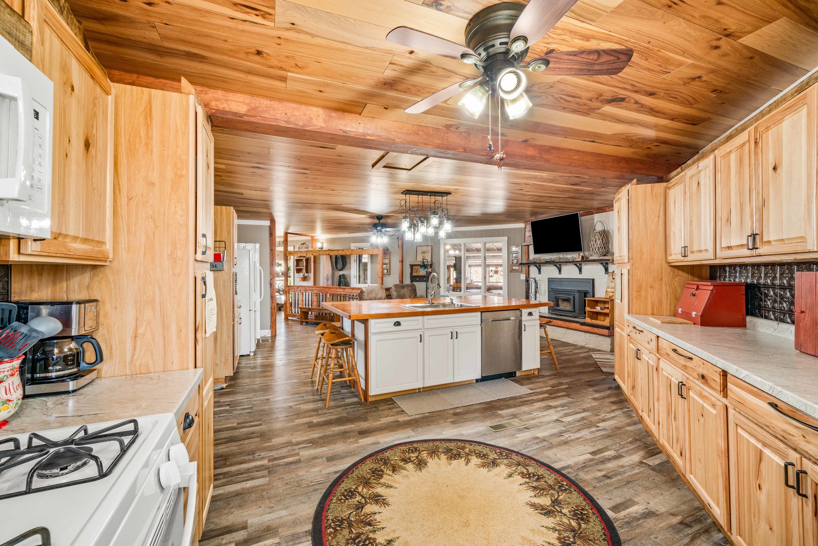 4444 Wesley Freebairn Road Earlville, IL 60518 - Photo 20 of 68 a kitchen with stainless steel appliances kitchen island granite countertop a sink a counter space cabinets and stainless steel appliances