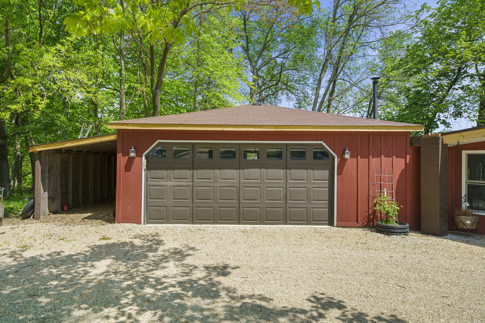 4444 Wesley Freebairn Road Earlville, IL 60518 - Photo 36 of 68 a front view of a house with a yard and garage