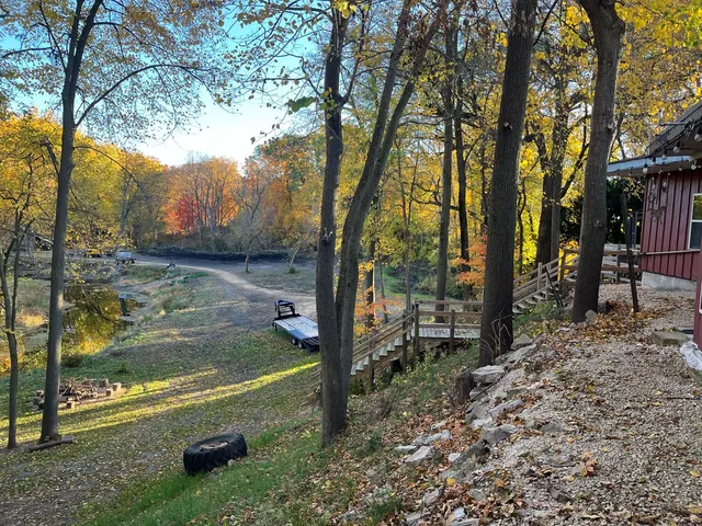 a view of a lake with a yard