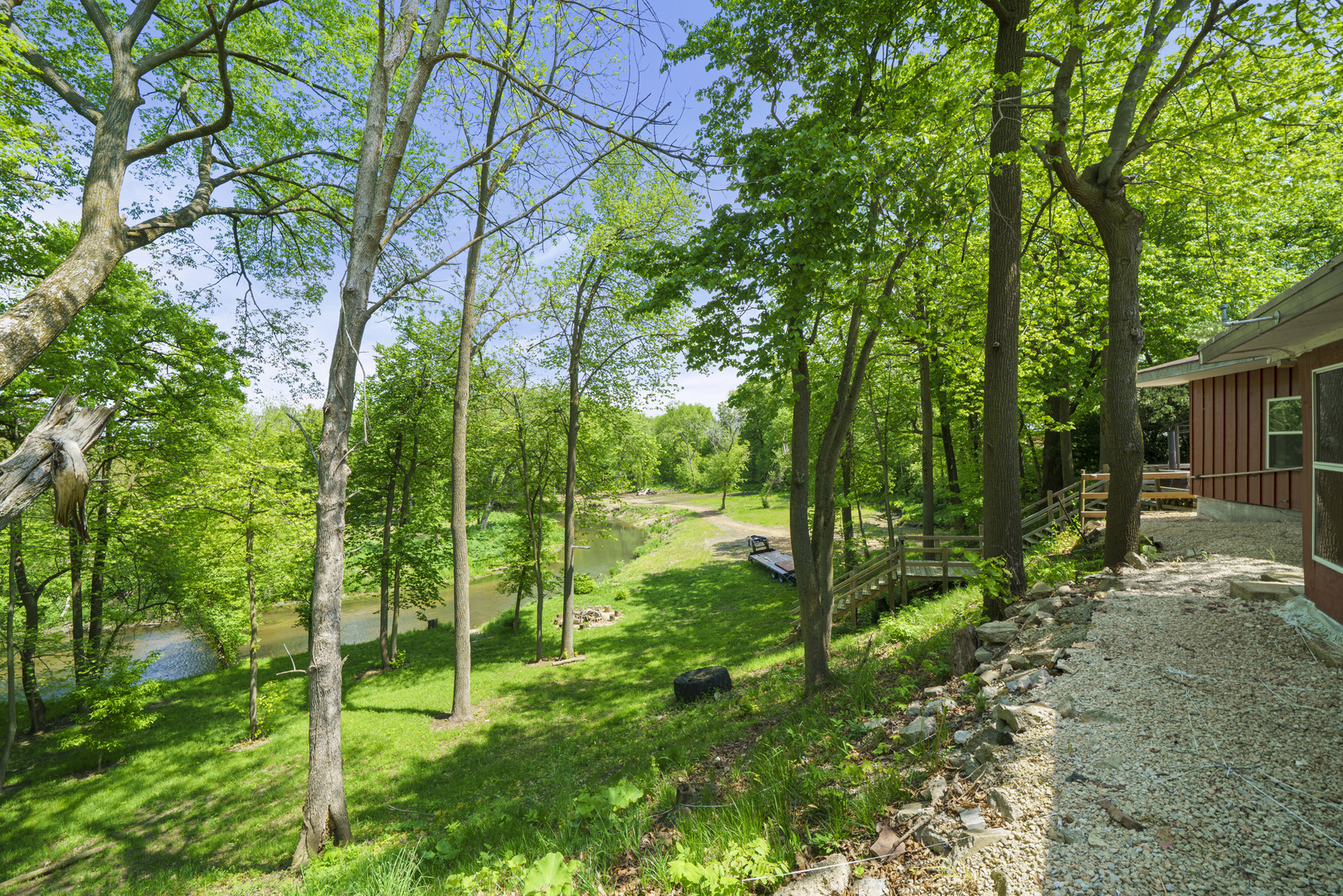 4444 Wesley Freebairn Road Earlville, IL 60518 - Photo 56 of 68 a view of a backyard with plants and large trees