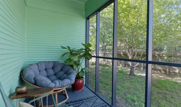 a view of a house with a backyard and a garage