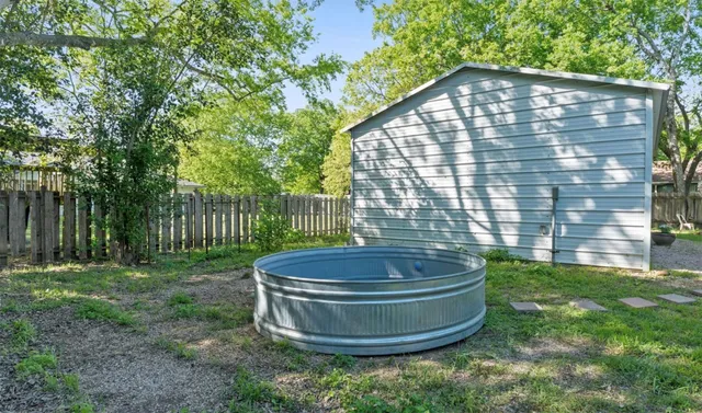 a view of a backyard with plants