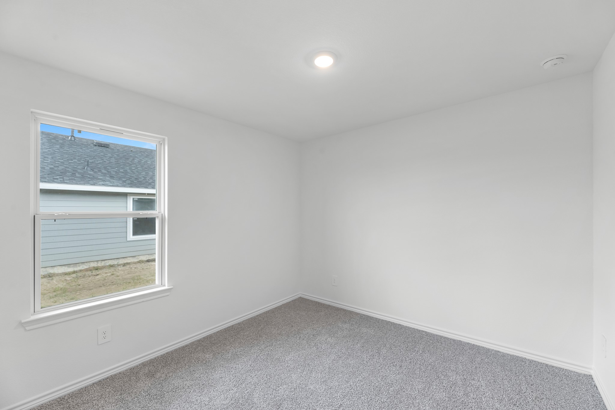 5680 Spoonbill Orange, TX 77632 - Photo 12 of 23 an empty room with a window
