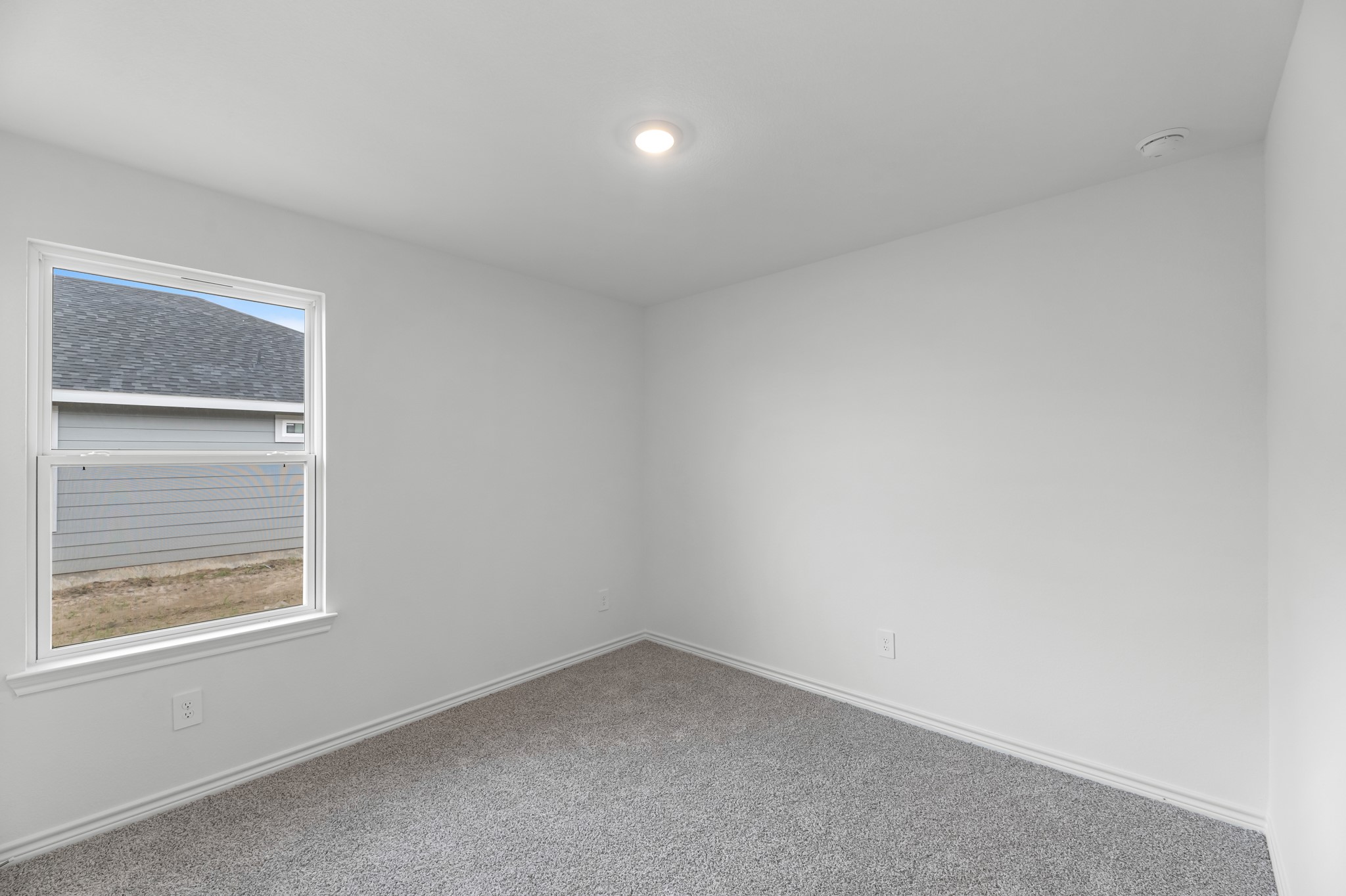 5680 Spoonbill Orange, TX 77632 - Photo 14 of 23 an empty room with a window