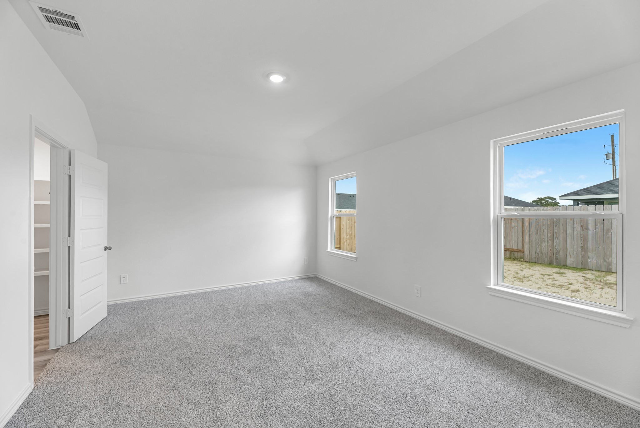 5680 Spoonbill Orange, TX 77632 - Photo 16 of 23 a view of an empty room with a window