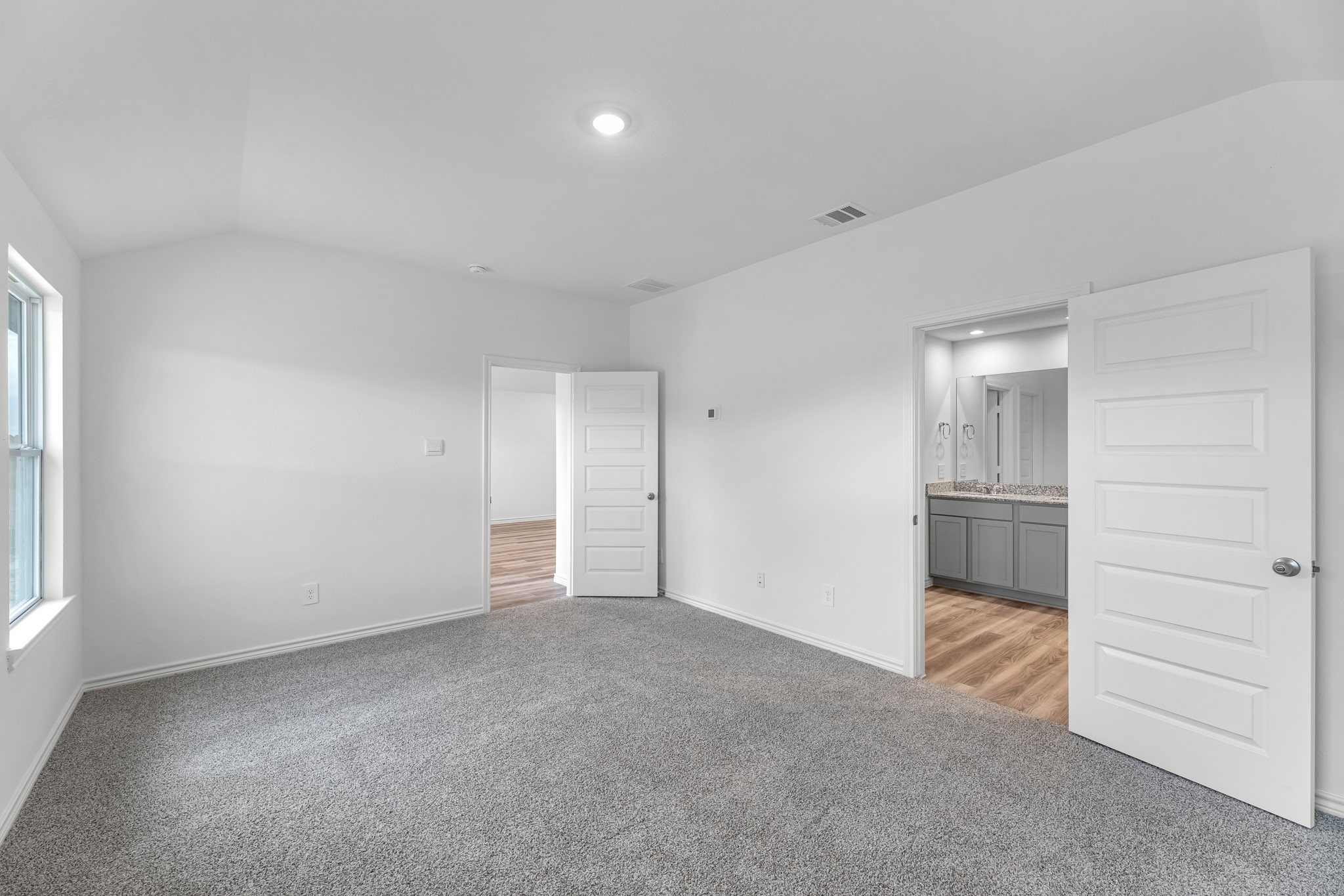 5680 Spoonbill Orange, TX 77632 - Photo 17 of 23 a view of an empty room and a window
