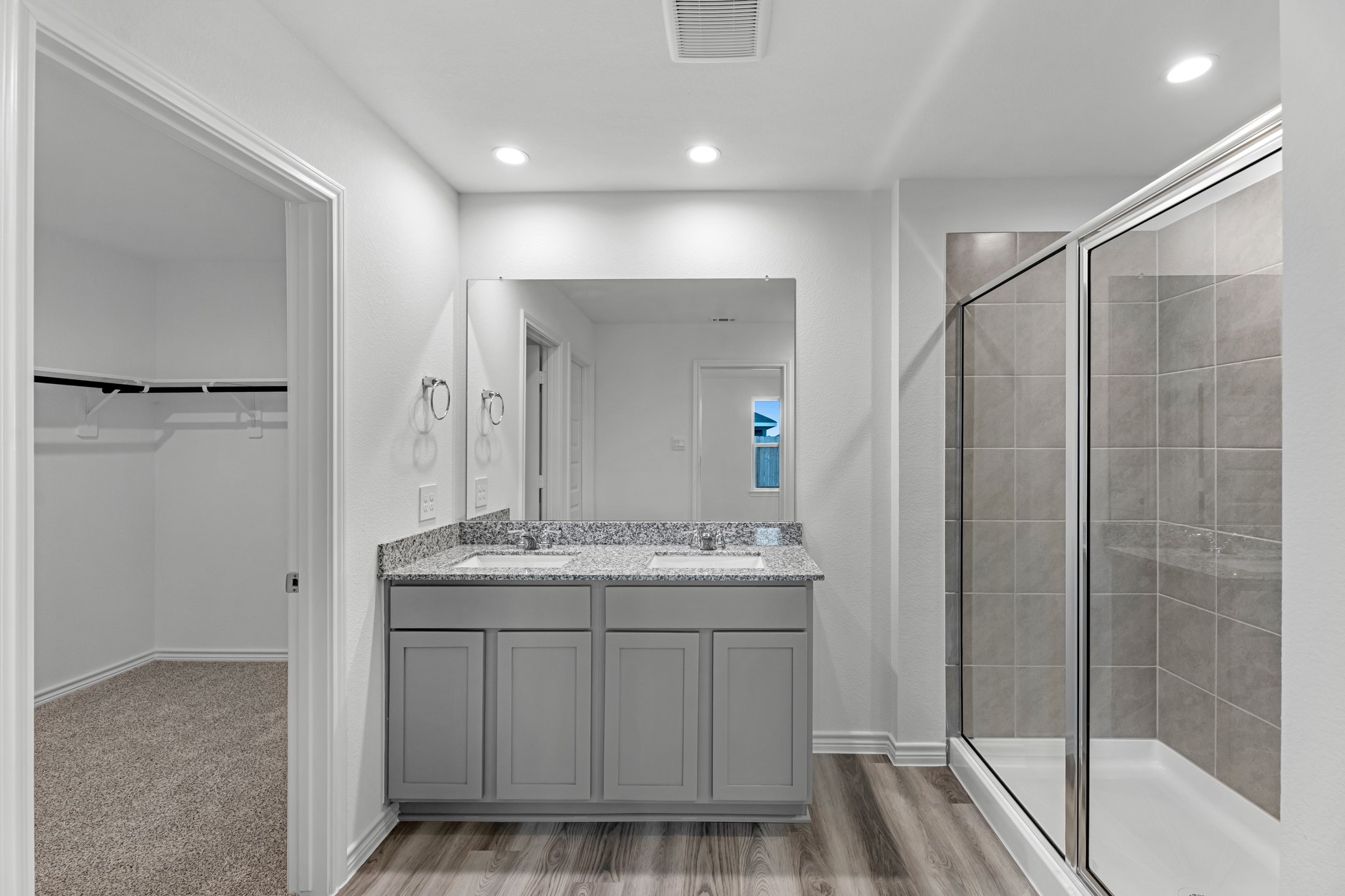 5680 Spoonbill Orange, TX 77632 - Photo 18 of 23 a bathroom with a sink and a mirror