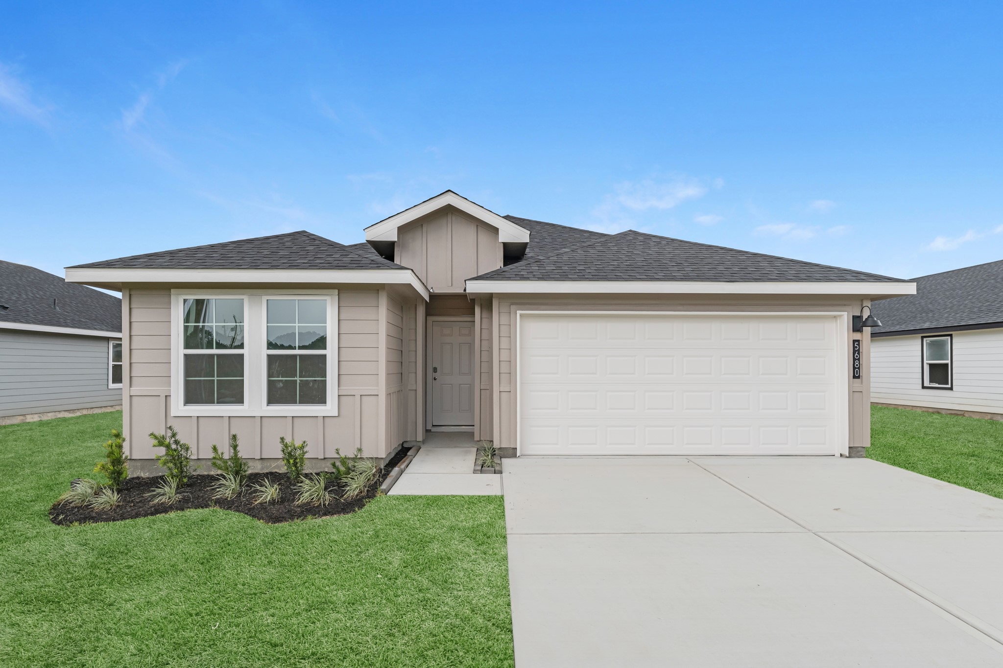 5680 Spoonbill Orange, TX 77632 - Photo 21 of 23 front view of house with a yard