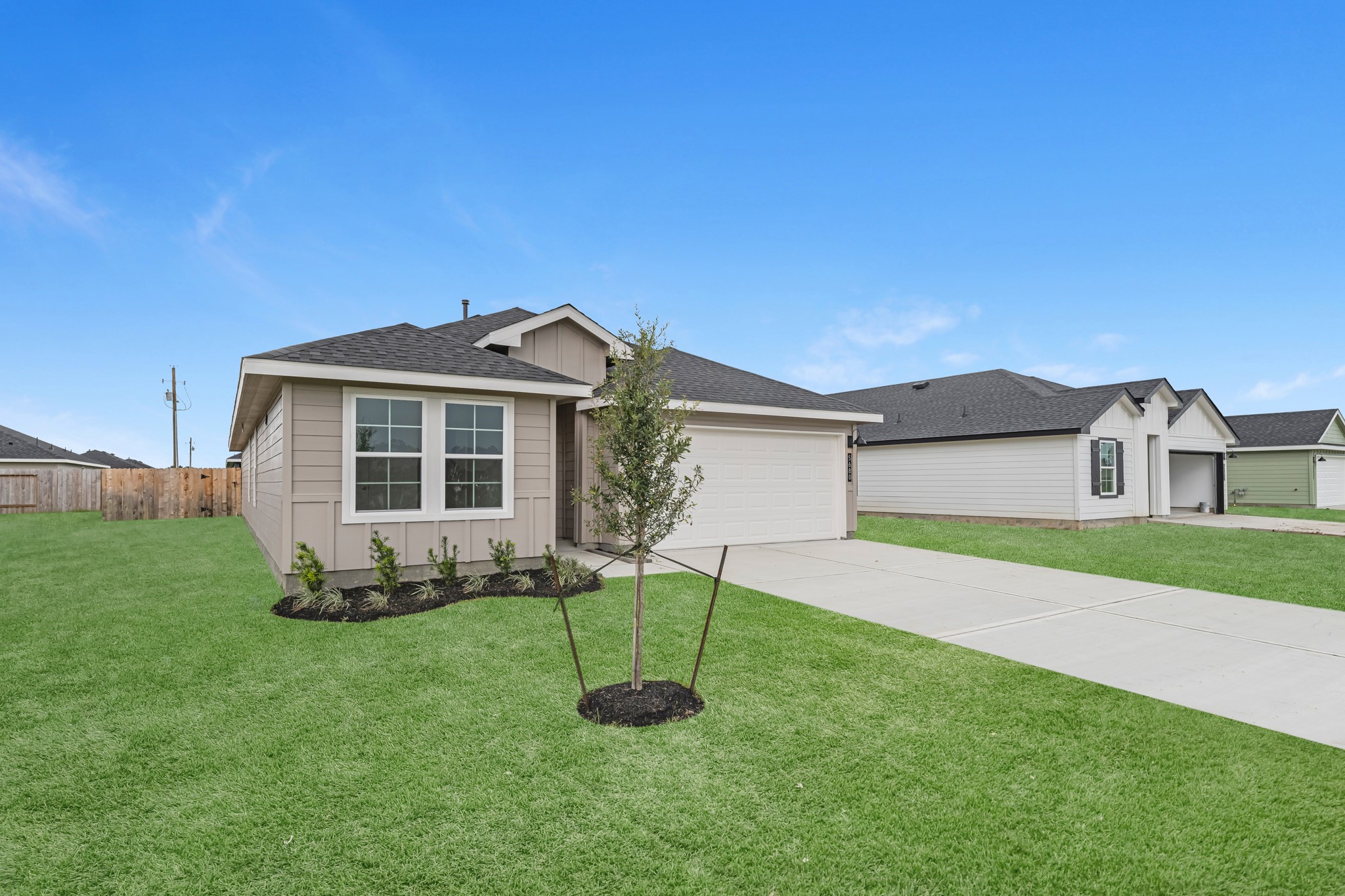 5680 Spoonbill Orange, TX 77632 - Photo 22 of 23 a view of a house with a yard