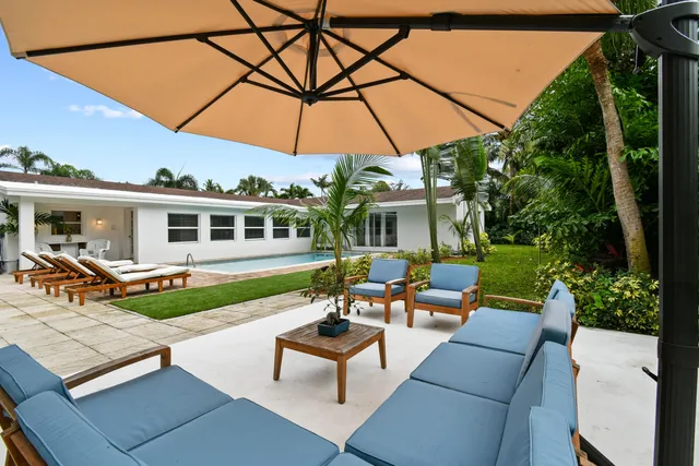 a view of a building with a swimming pool