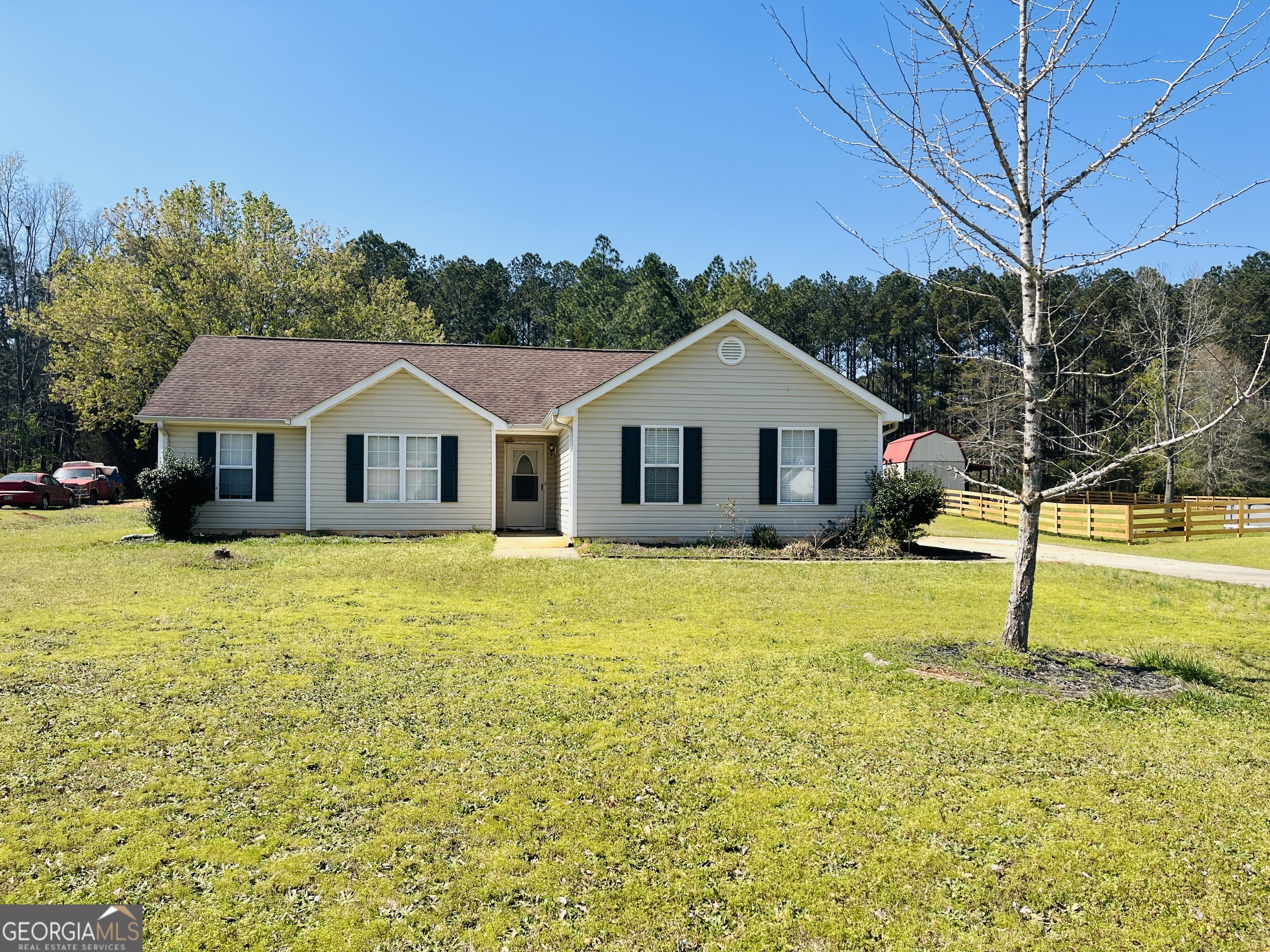 405 Peeks Crossing Drive Senoia, GA 30276 - Photo 1 of 31 a aerial view of a house with swimming pool