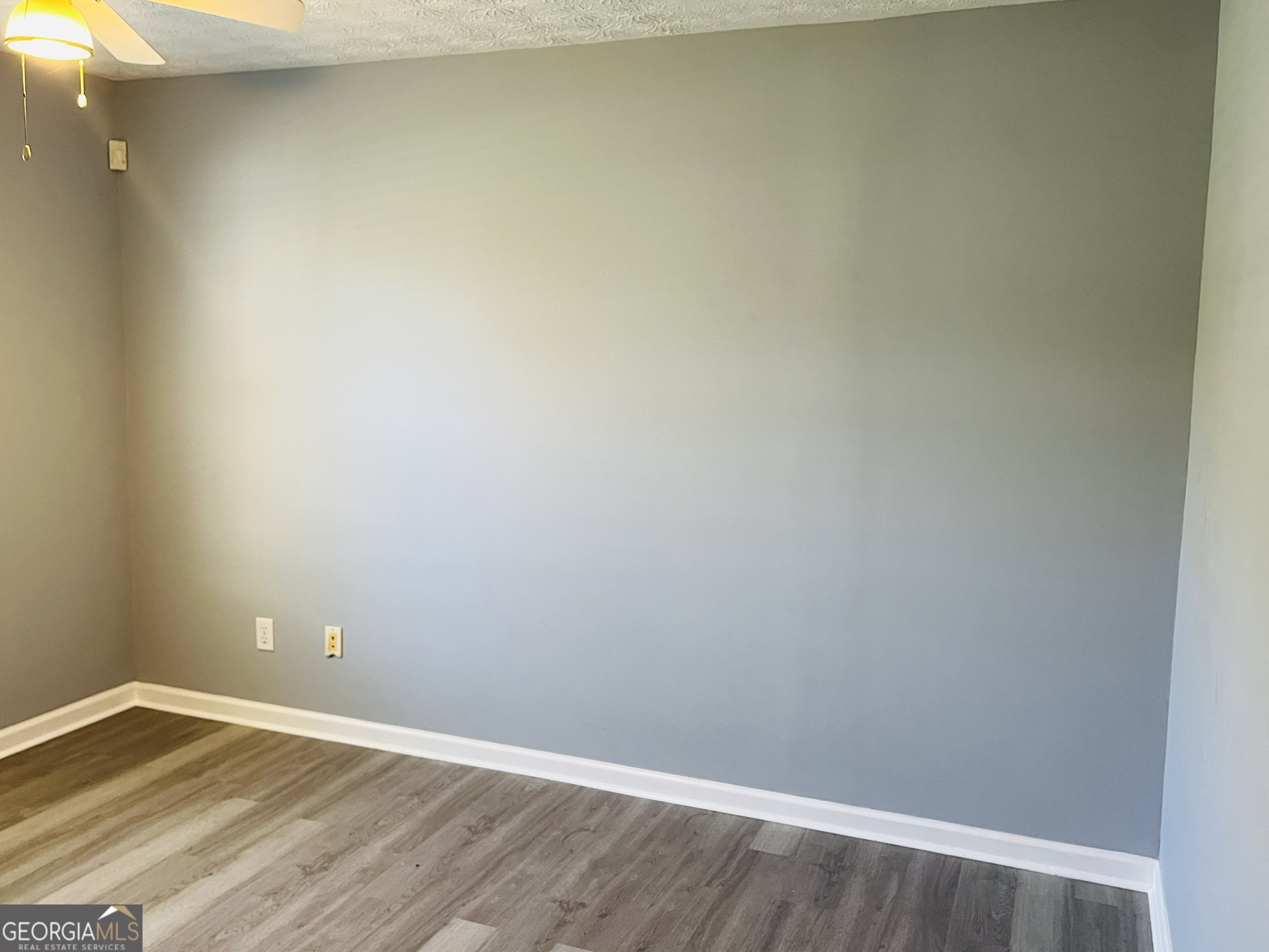 405 Peeks Crossing Drive Senoia, GA 30276 - Photo 14 of 31 a view of an empty room