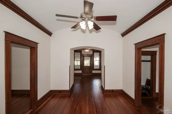 a view of an entryway with wooden floor