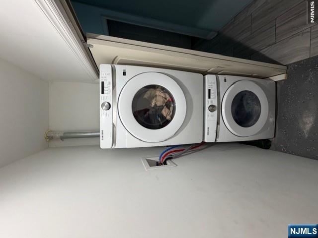 177 Maple Street Fairview, NJ 07022 - Photo 15 of 24 a utility room with dryer and washer