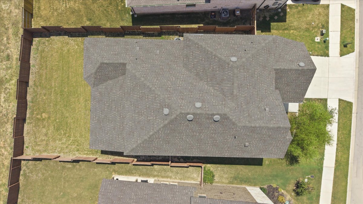 109 Rocky River Road Georgetown, TX 78628 - Photo 34 of 37 An aerial perspective reveals a shingle roof crowning this well-maintained residential property.