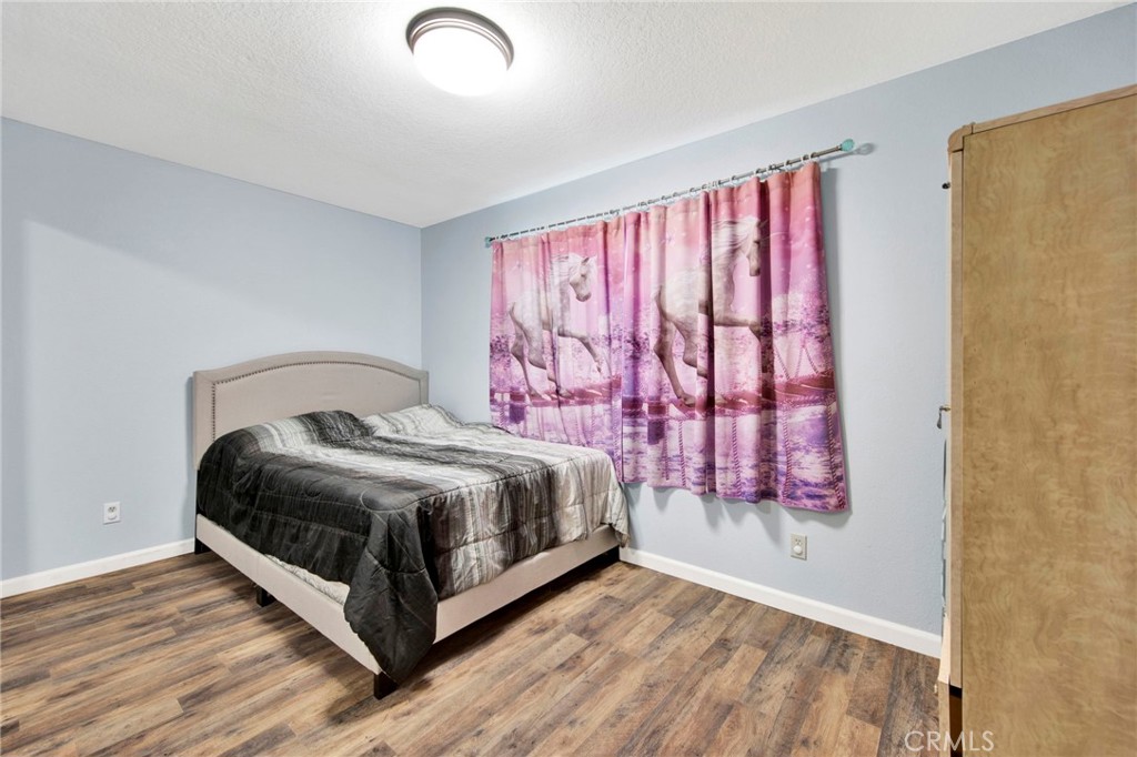 31511 Indian Oak Road Acton, CA 93510 - Photo 13 of 32 a bedroom with a bed and a window