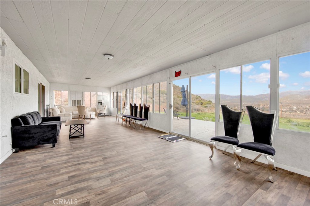 31511 Indian Oak Road Acton, CA 93510 - Photo 19 of 32 a living room with furniture and large windows
