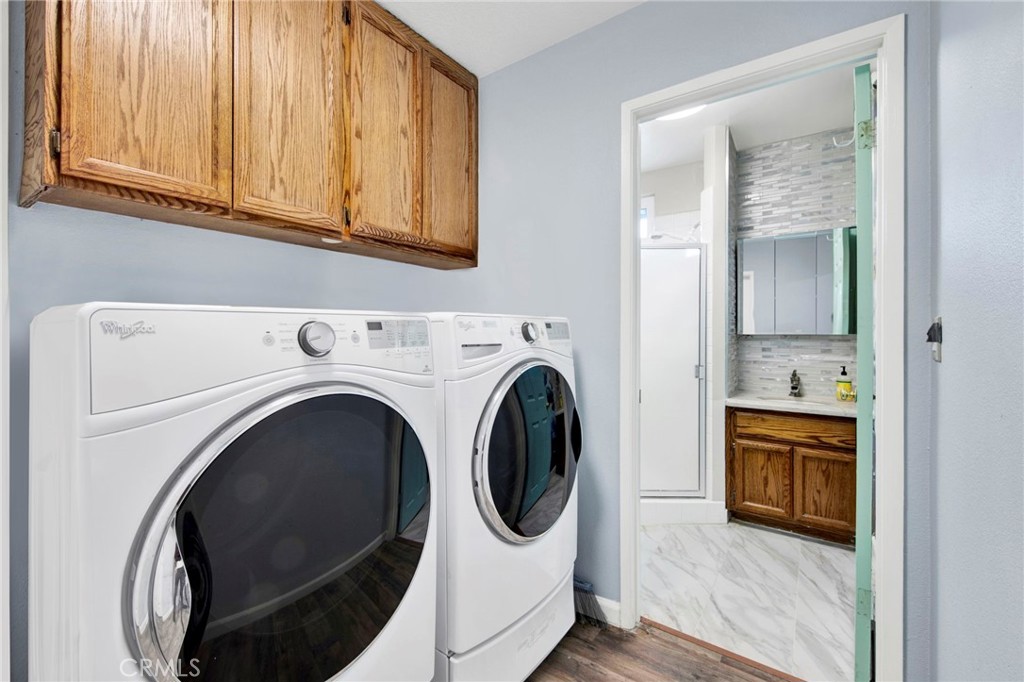 31511 Indian Oak Road Acton, CA 93510 - Photo 21 of 32 a utility room with dryer and washer