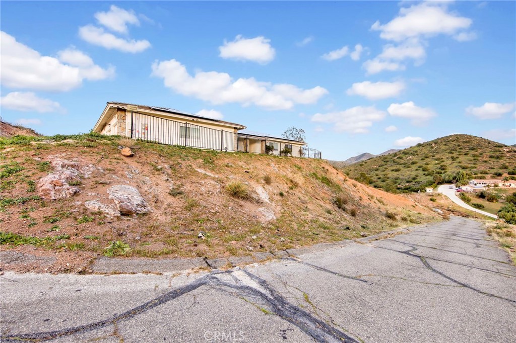 31511 Indian Oak Road Acton, CA 93510 - Photo 25 of 32 a front view of a house with a yard
