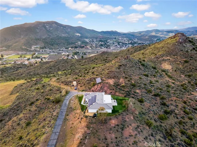 a view of a city with mountains in the background