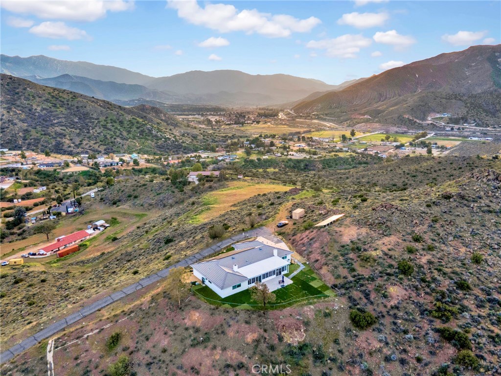 31511 Indian Oak Road Acton, CA 93510 - Photo 29 of 32 a view of a city with mountains in the background