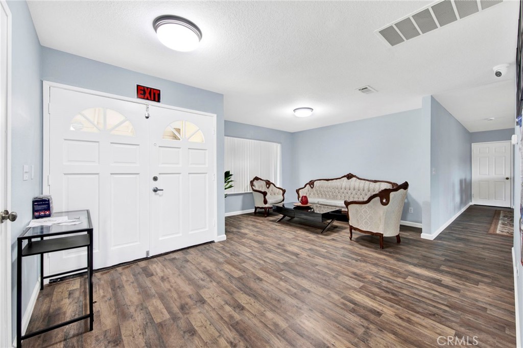 31511 Indian Oak Road Acton, CA 93510 - Photo 3 of 32 a living room with furniture and a wooden floor