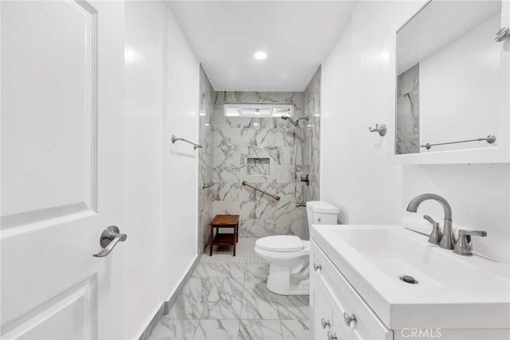 31511 Indian Oak Road Acton, CA 93510 - Photo 10 of 32 a bathroom with a sink toilet and shower