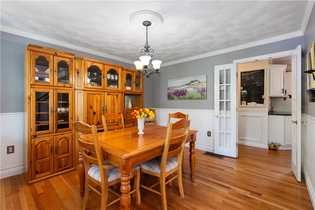 5 Victoria Lane Rehoboth, MA 02769 - Photo 21 of 48 Located to left of staircase is the formal dining room with French door, crown molding & raised paneling.