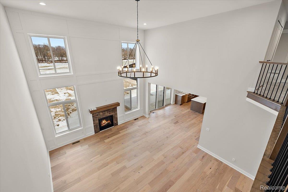 53650 Romeo Plank Road Macomb, MI 48042 - Photo 33 of 64 Two Story great room with gas fireplace