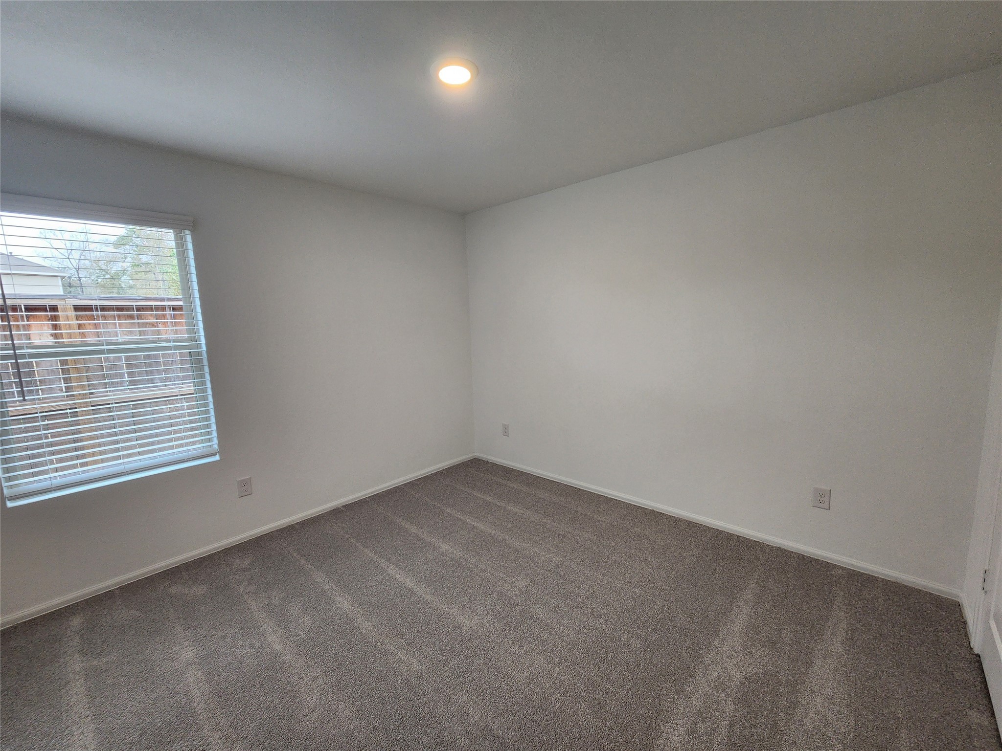 1954 Ballesteros Street Crosby, TX 77532 - Photo 13 of 16 an empty room with a window
