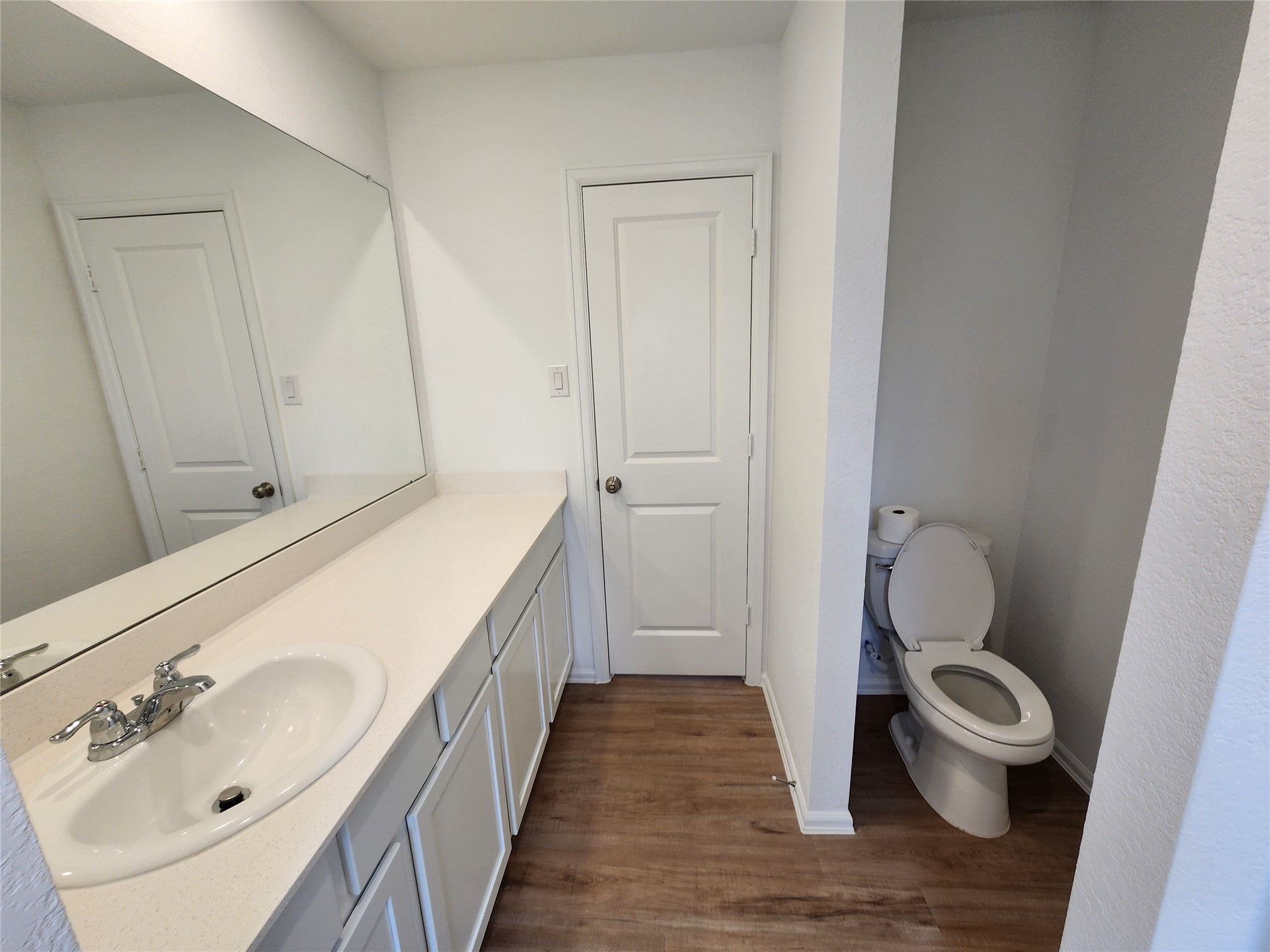 1954 Ballesteros Street Crosby, TX 77532 - Photo 14 of 16 a bathroom with a sink and toilet