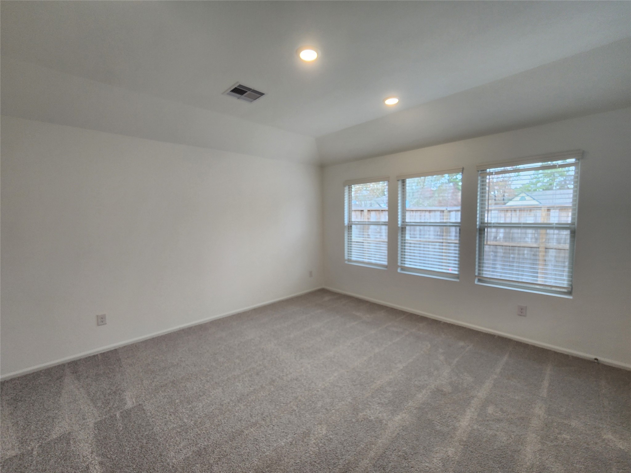 1954 Ballesteros Street Crosby, TX 77532 - Photo 9 of 16 an empty room with windows
