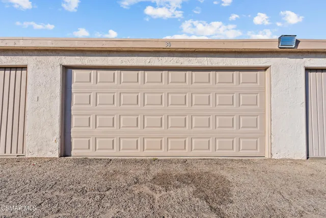 a view of a swimming pool with a yard