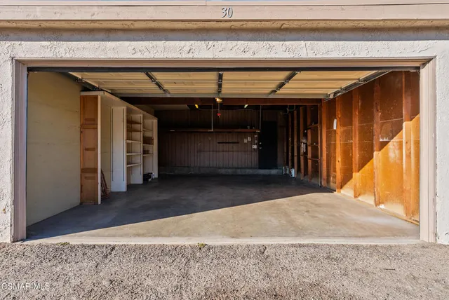 a view of a park with large trees