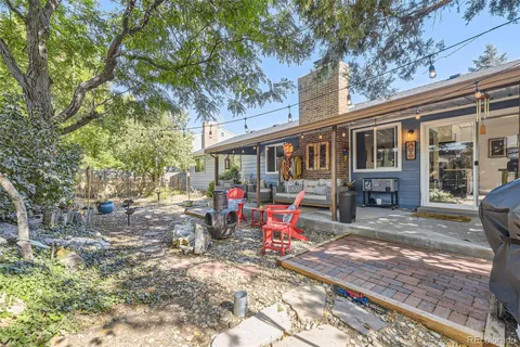 a backyard of a house with seating space