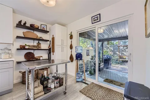 a kitchen with stainless steel appliances granite countertop a stove and a cabinets