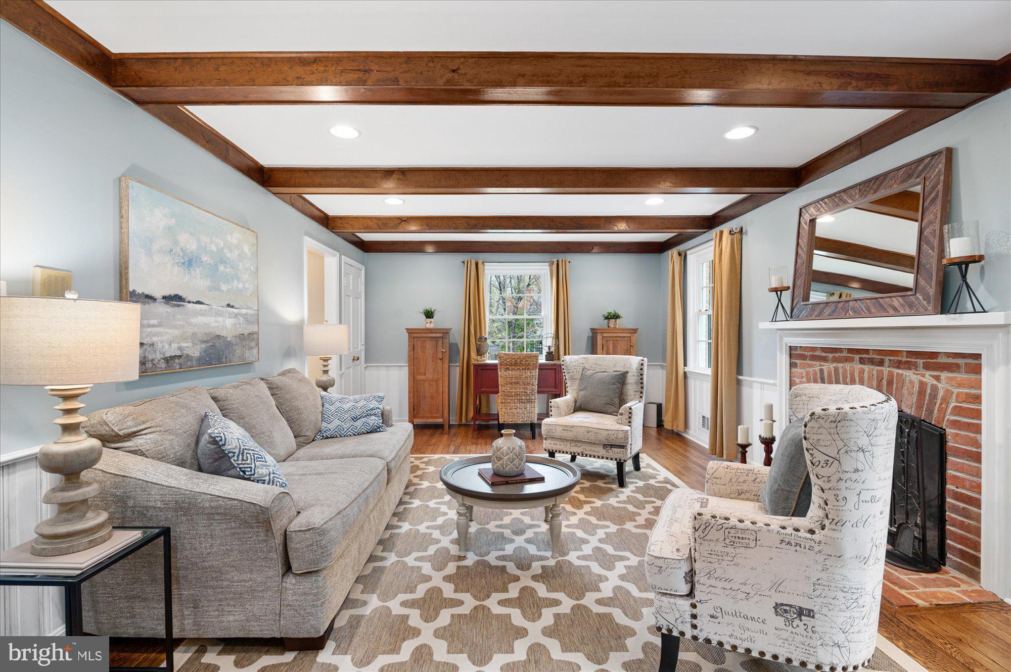 7500 Hackamore Drive Potomac, MD 20854 - Photo 4 of 20 Charming Family Room with Wood-Burning Fireplace