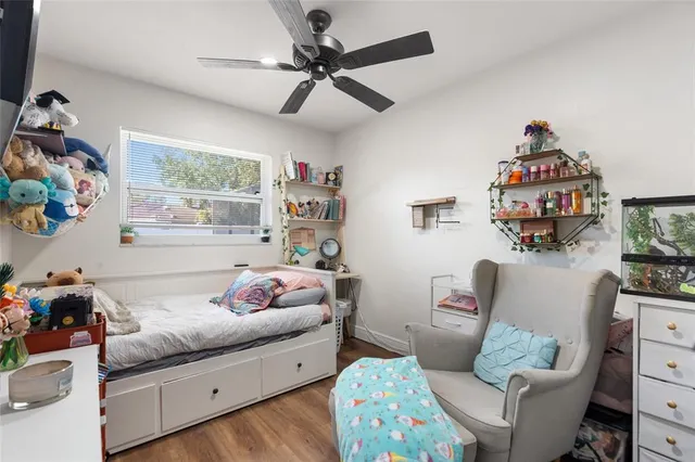 a bedroom with furniture and a bed