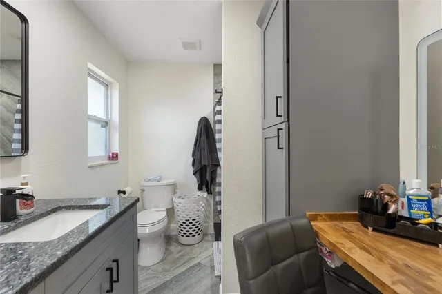 a view of bathroom with dual sinks