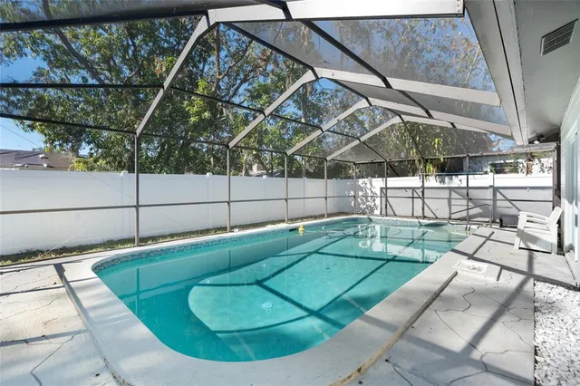 a view of a house with backyard