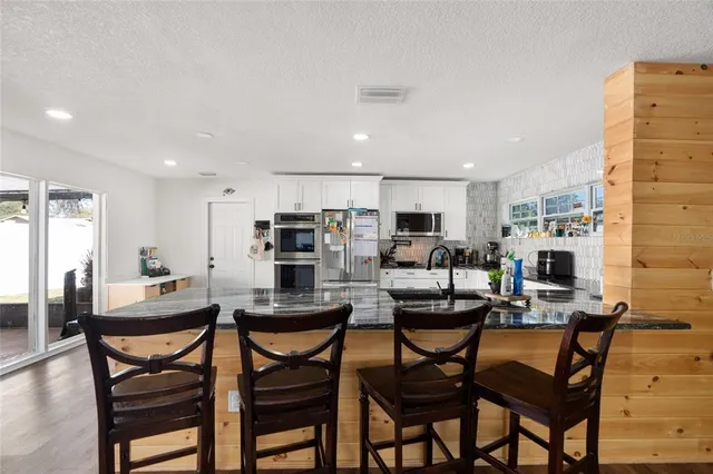 a view of a dining room with furniture