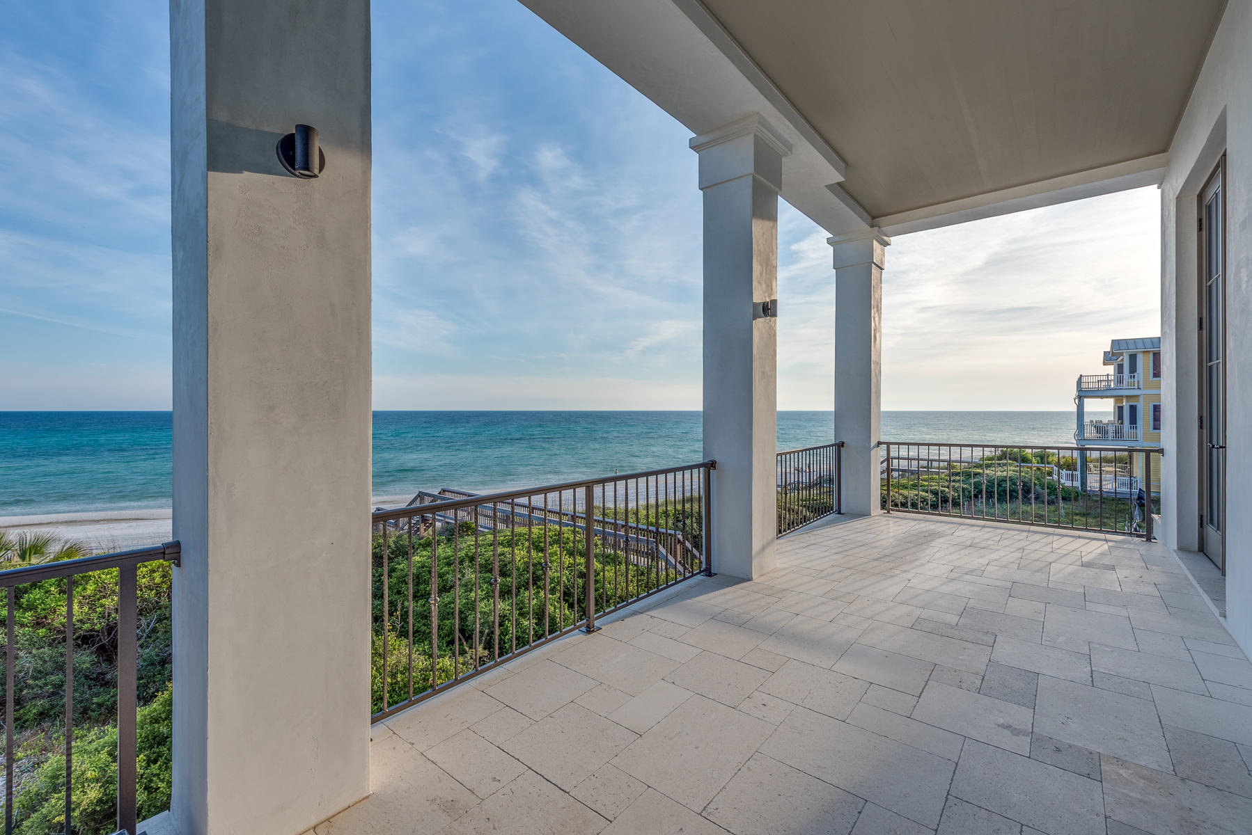 a view of a balcony with city view