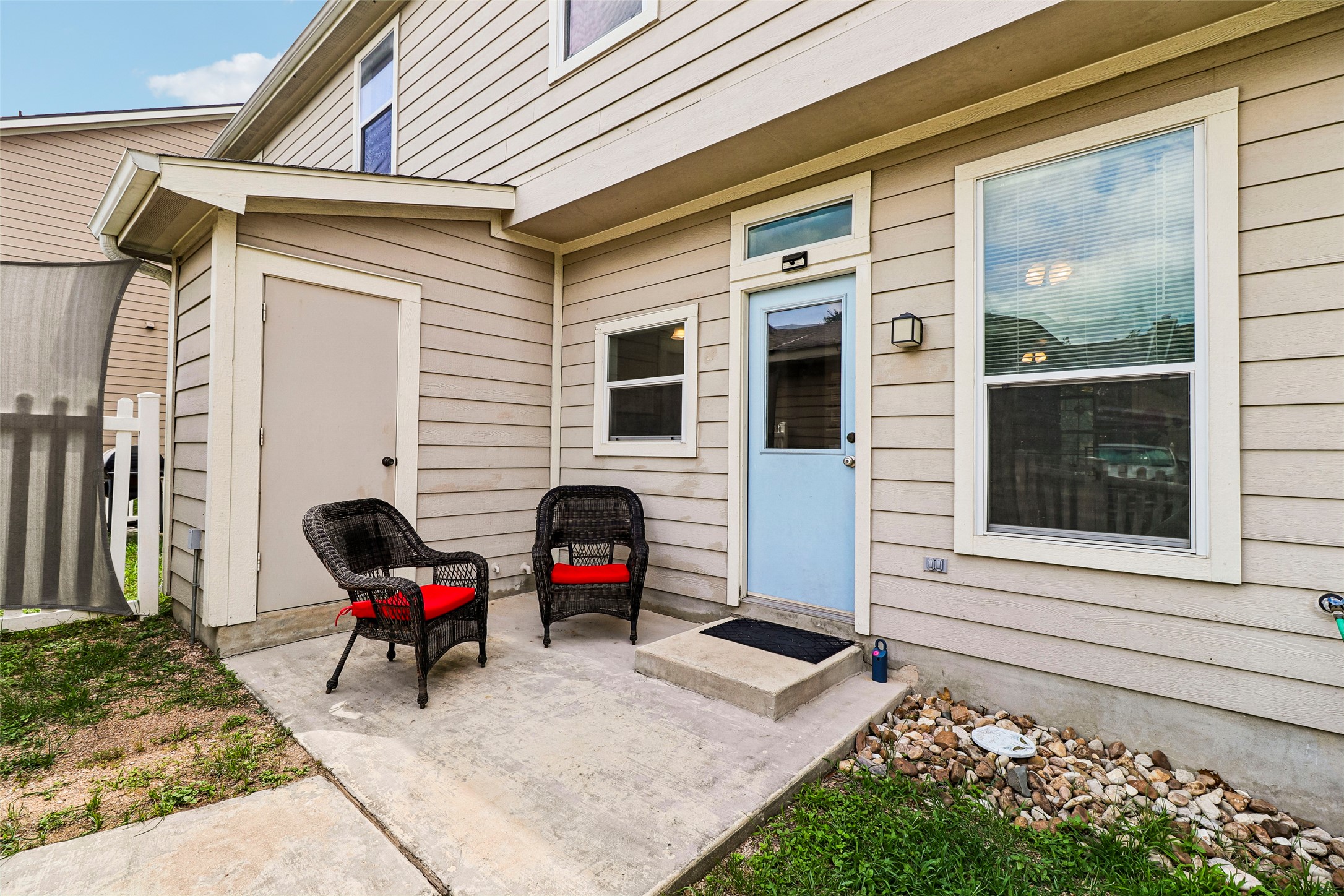 311 A Utterback Kyle, TX 78640 - Photo 28 of 40 a view of backyard with seating space and deck