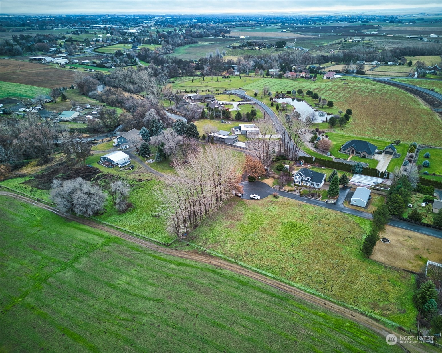 397 Triangle K Road Walla Walla, WA 99362 - Photo 1 of 4 an aerial view of residential houses with outdoor space and river