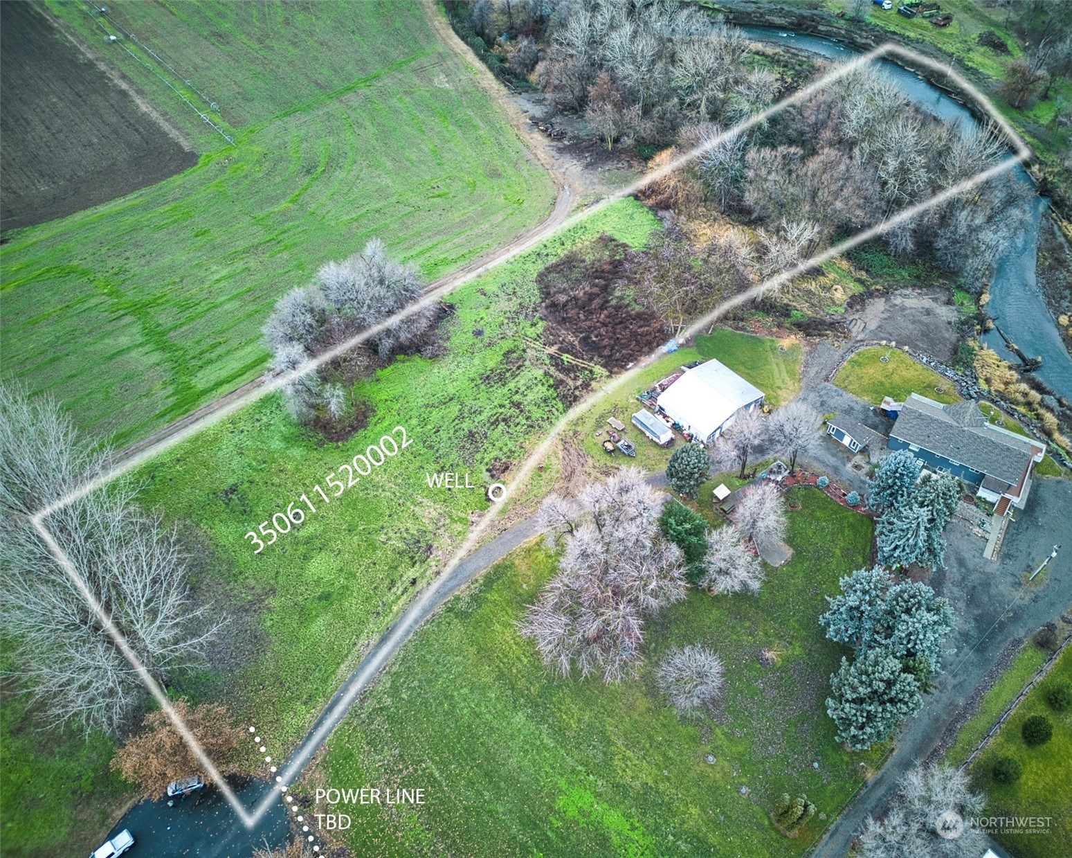 397 Triangle K Road Walla Walla, WA 99362 - Photo 3 of 4 a view of a lake with a yard
