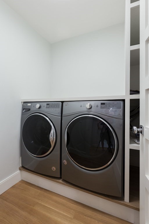44 Upton Street, Unit 1 Boston, MA 02118 - Photo 28 of 35 a utility room with dryer and washer
