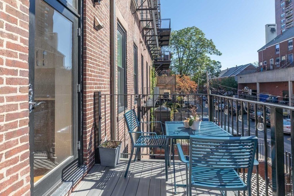 44 Upton Street, Unit 1 Boston, MA 02118 - Photo 33 of 35 a balcony view with a outdoor seating space