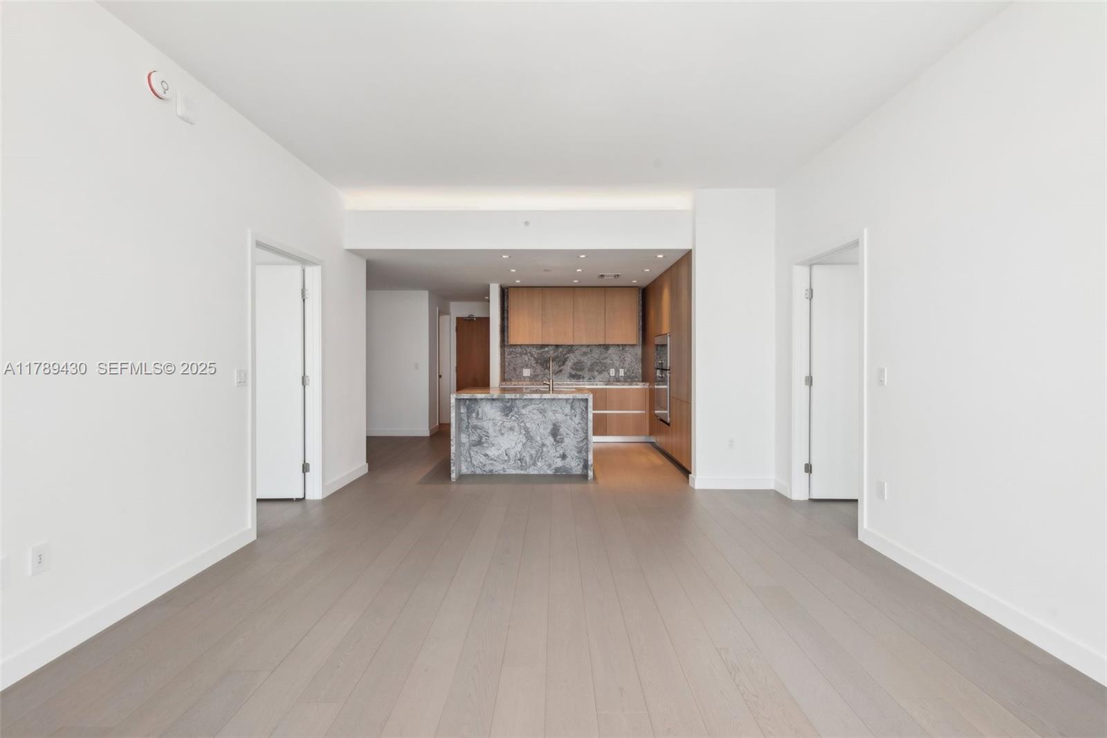 500 Alton Road, Unit 3004 Miami Beach, FL 33139 - Photo 5 of 31 a view of an empty room with a cabinet