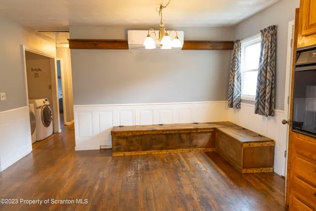 a bathroom with a bathtub and a sink